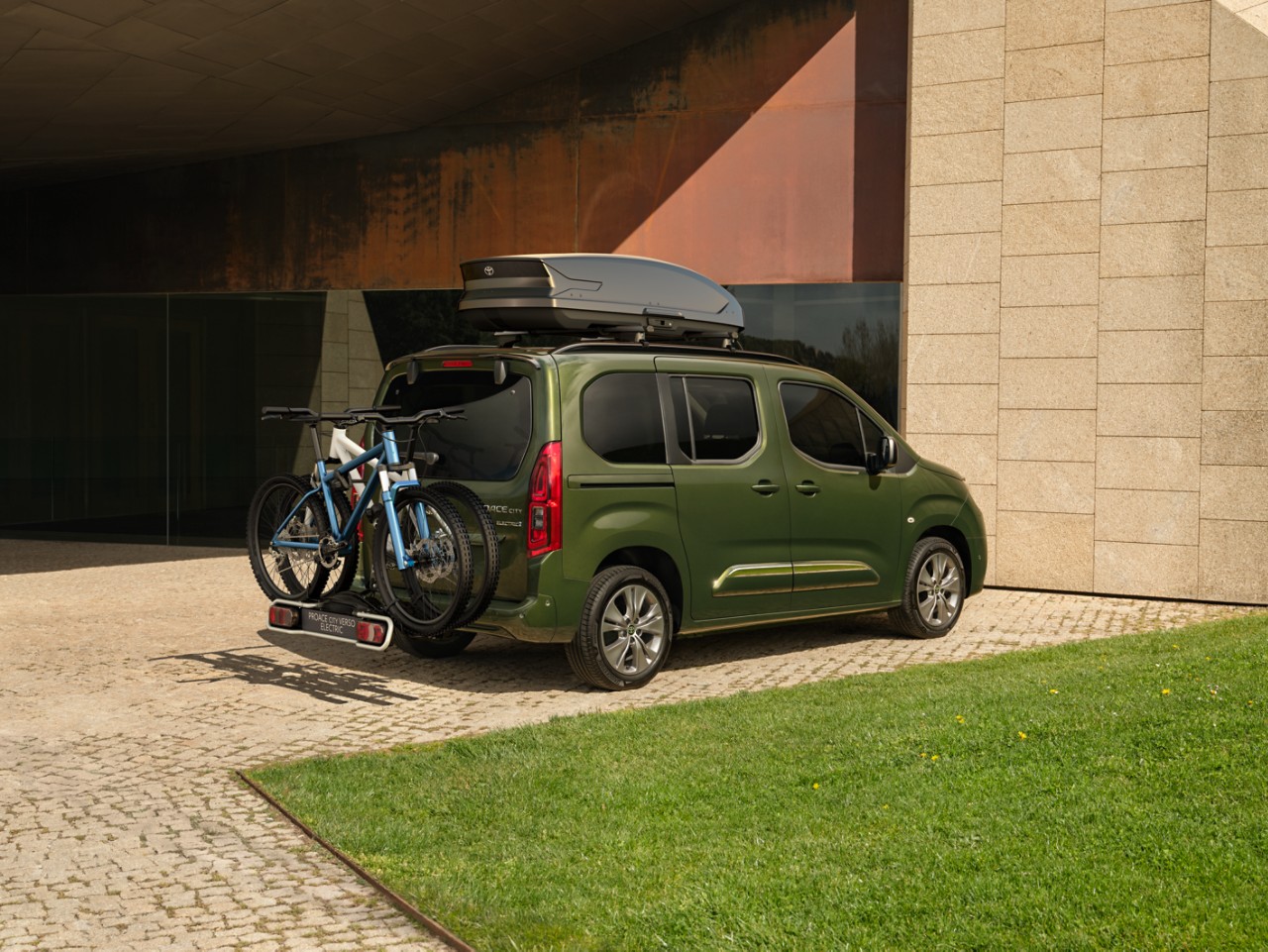 A Proace City Verso with its rear doors open 